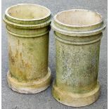 A pair of circular concrete turrets, 54cm high.