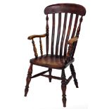 A Victorian beech and elm lath back Grandmother chair, with turned arm supports, legs and H frame st