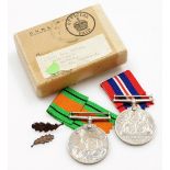 Two World War II medals, to include 1939-1945 medal with green and orange ribbon, the 1939-1945 defe