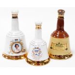 Three Bells scotch whisky decanters, to include a commemorative porcelain decanter 50cl, and two 75c