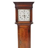 An early 19thC mahogany longcase clock, the square white painted dial with floral decoration, 30cm x