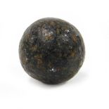 An iron musket ball, 2.5cm diameter.