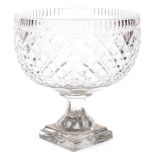 A heavy cut crystal pedestal bowl, with hobnail cut decoration and stepped square base, 26cm high.