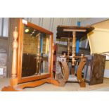 A group of furnishings, to include an oak framed dressing table mirror, two magazine racks and an oa