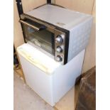 Two kitchen electricals, to include a Cookworks tabletop electric oven and a tabletop fridge.