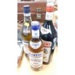 Three bottles of alcohol, to include Martini, Cinzano and a further bottle of Martini. (3)