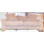 A Next brown material two seater sofa, 183cm wide, 94cm deep.