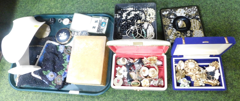 A group of various costume jewellery, to include clip on earrings, book metal brooches, necklace sta