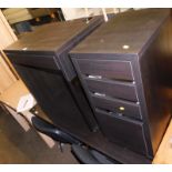 A black finish office desk and filing drawer, the office desk with single pull out drawer and circul