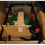 A Qualcast Easi-Lite 28 electric lawnmower, boxed.