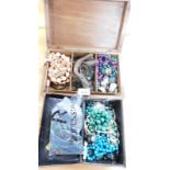 Two jewellery boxes and contents, comprising mainly beaded necklaces, some rock samples, loose beads