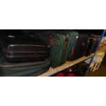 Various suitcases, material cases, ties, and two Potterton cases. (9)