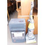 A Dyson vacuum cleaner and a Bullfinch Remington storage heater. (2)