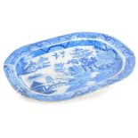 A 19thC Staffordshire pearlware Willow pattern meat dish. (AF)