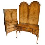A 1930's burr walnut four piece bedroom suite, in Queen Anne style, comprising double dome wardrobe,