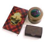 An early 20thC tartan ware notebook blotter, with McGilvray tartan, 10cm high, a treen snuff box, an