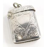 A Victorian silver Vesta case, of small proportion, of rounded form with hook top and match strike e