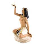 A Nadal ceramic figure of Cleopatra, holding a dove on a stylised rock base. (AF)