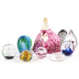 A collection of art glass paperweights, various styles and makes and a Royal Doulton figurine Victor