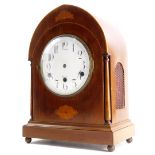 A late 19thC/early 20thC mahogany and marquetry clock case, the white enamel dial with Roman numeral