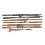 Three pairs of vintage ski's, to include a pair stamped Lampinen Porvoo and a pair of ski poles.