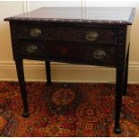 An 18thC oak side table, with later demi-lune carving having an arrangement of three frieze drawers,