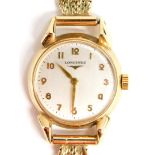 A Longines ladies 9ct gold wristwatch, with gold strap, 23.3g all in.