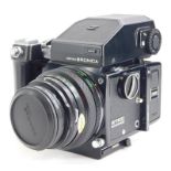 A Zenza Bronica ETRS SLR film camera, fitted with a Zenzanon 75mm f2.8 lens, with a Zenzanon 150mm f