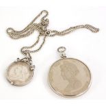 Two items of silver coin jewellery, comprising an 1897 Victoria shilling, in silver mount, on silver