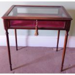 A Victorian style bijouterie cabinet, with bevel glazed panels and fluted taper turned legs, 72cm x