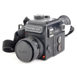 A Rolleiflex 3003 SLR camera, with Zeiss Planar f1.8 50mm lens.