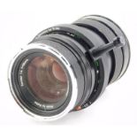 A Rollei HFT Sonnar f4 150mm Telephoto lens, for a Rolleiflex 6008AF.