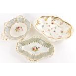 Three Rockingham silver shaped dishes c1830, decorated with flower groups. (3)