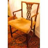 A 19thC mahogany carver chair, with pierced bar splat in the Chippendale manner, on square legs and