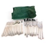 An Art Deco silver plates stainless steel entree set, with shaped handles, comprising knives and thr