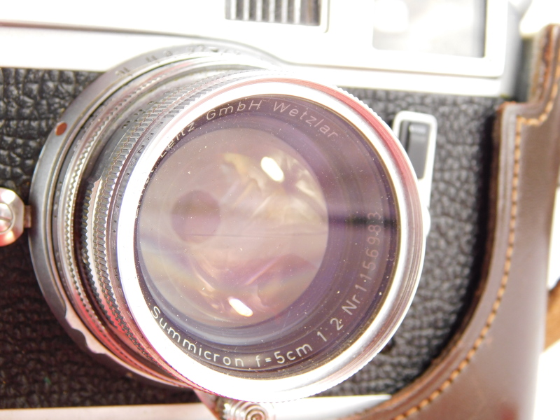 A Leica M4 camera, serial number 1270524, with a Leitz 5cm f2 Summicron lens, number 1156983, in a l - Image 2 of 3