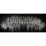 Various decorative and other drinking glasses, some etched examples, champagne style saucers, 12cm h