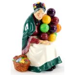 A Royal Doulton porcelain figurine, The Old Balloon Seller, HN1315, 19cm high.