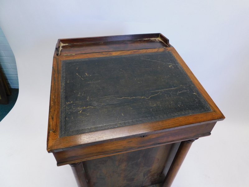 A Victorian rosewood Davenport, the hinged top with a leather insert enclosing a birds eye maple ven - Image 2 of 2