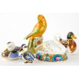 A Royal Crown Derby swan paperweight, a Royal Crown Derby duck paperweight and three other bird pape