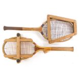 Two vintage tennis rackets, one indistinctly stamped, the other stamped for Birmingham Household Sup