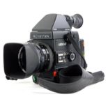 A Rolleiflex 6008AF camera, with Zeiss Planar f2.8 50mm lens, Pentaprism and handgrip.