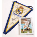 A collection of Real Madrid Football Club memorabilia, to include a signed pennant, with certificate