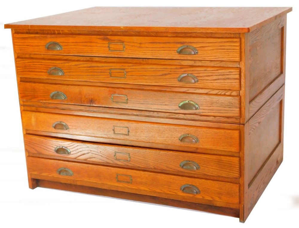 An oak plan chest, in two parts with six drawers, and brass effect fittings, 87cm high, 120cm wide,