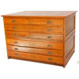 An oak plan chest, in two parts with six drawers, and brass effect fittings, 87cm high, 120cm wide,