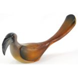 A Knysna artist feathers collectors carved wooden figure, modelled in the form of a grey hornbill, s
