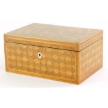 A 19thC parquetry work box, with a fanned out scale panel, with cross banding, velvet lined interior
