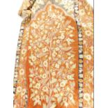 An Arts and Crafts style tree of life design rug or wall hanging, decorated with birds and flowers,