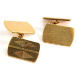 A pair of 9ct gold George V cufflinks, of rectangular design with curved ends and engine turned deco