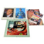 A collection of Formula One and motor racing ephemera, to include a Jenson Button photograph bearing